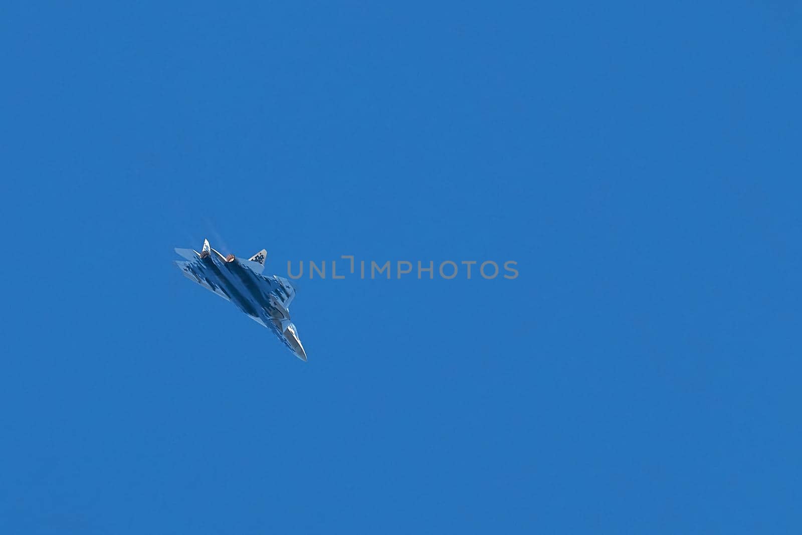 New Russian five generation fighter SU 57 (T-50) shows aerial maneuver battle at Moscow International Aviation and Space Salon MAKS 2019. RUSSIA, AUGUST 28, 2019.