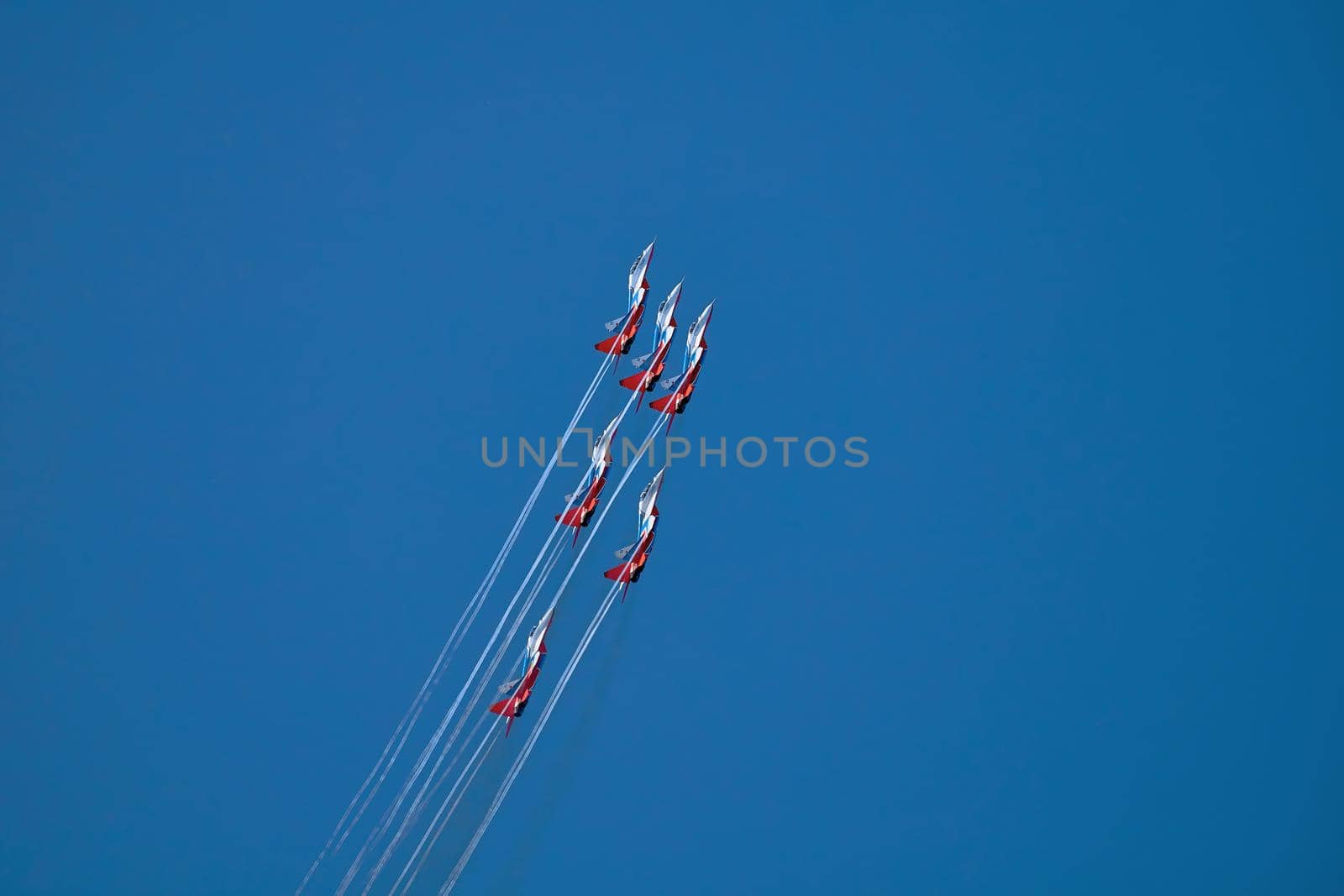 Airshow of the aerobatic team Strizhi (The Swifts). Aerobatic Team on fighters Mig-29, Russian Air Force, on at the International Aviation and Space salon MAKS 2019. ZHUKOVSKY, RUSSIA, 08,27,2019.