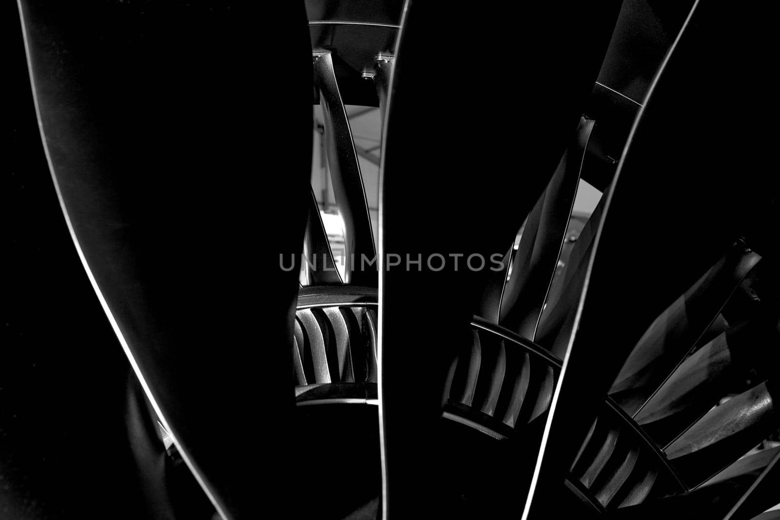 Modern turbofan engine. close up of turbojet of aircraft on black background. blades of the turbofan engine of the aircraft.