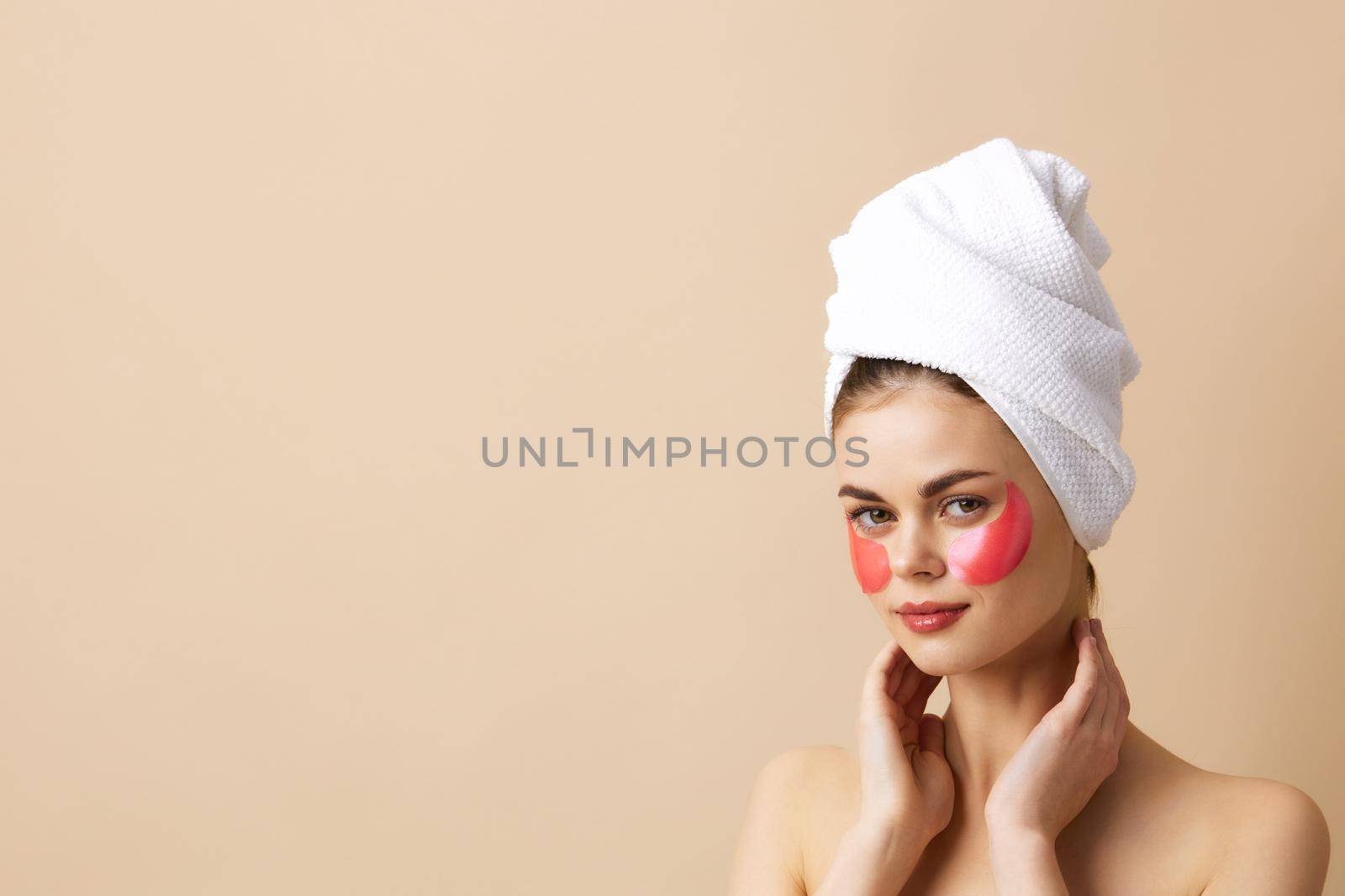 young woman pink patches clean skin smile posing isolated background. High quality photo