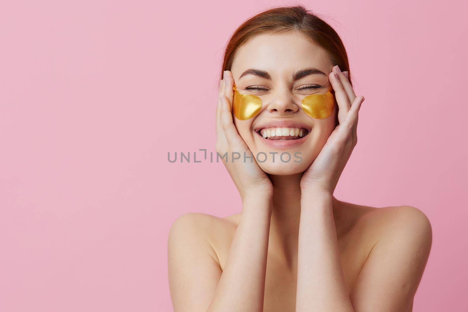 young woman golden patches clean skin smile posing isolated background by SHOTPRIME