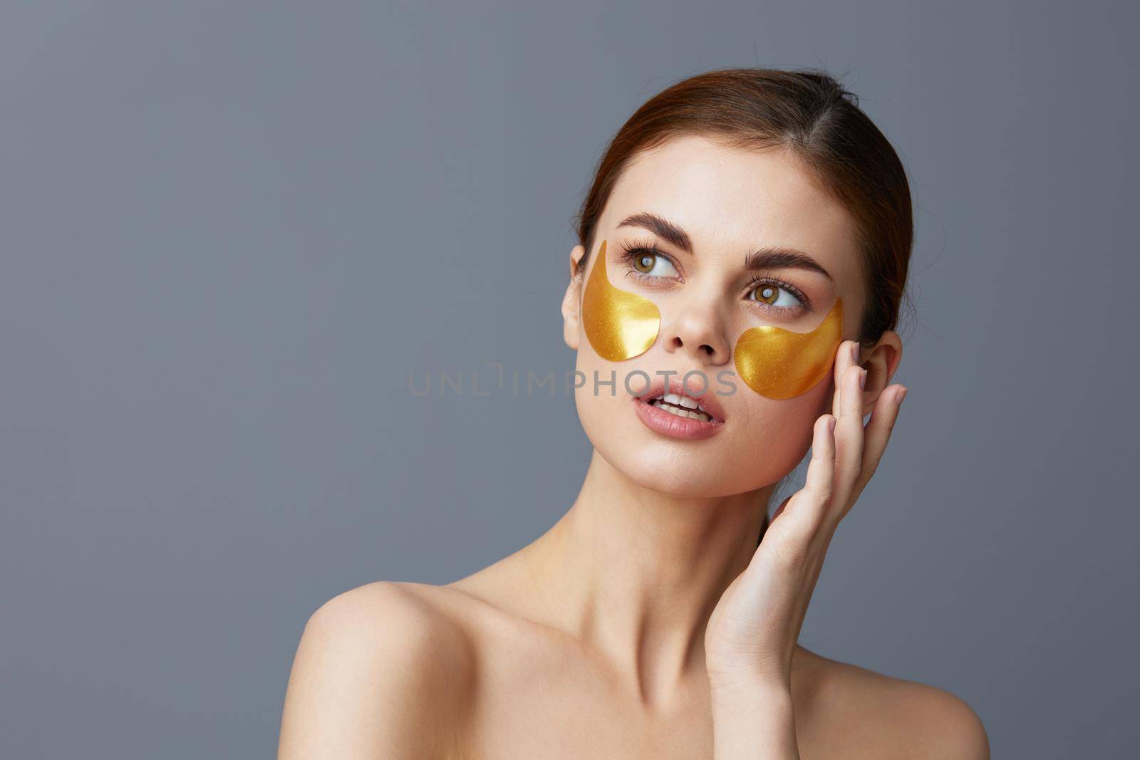 young woman golden patches on the face close-up Lifestyle by SHOTPRIME