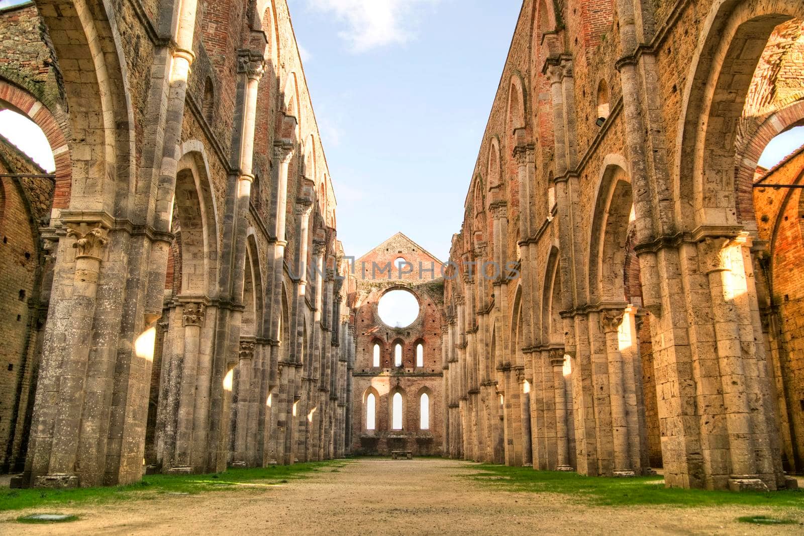 Photo shoot of the famous roofless church of San Galgano in the lands near Siena Italy 