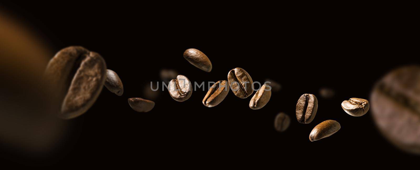 Coffee beans in flight on a dark background.