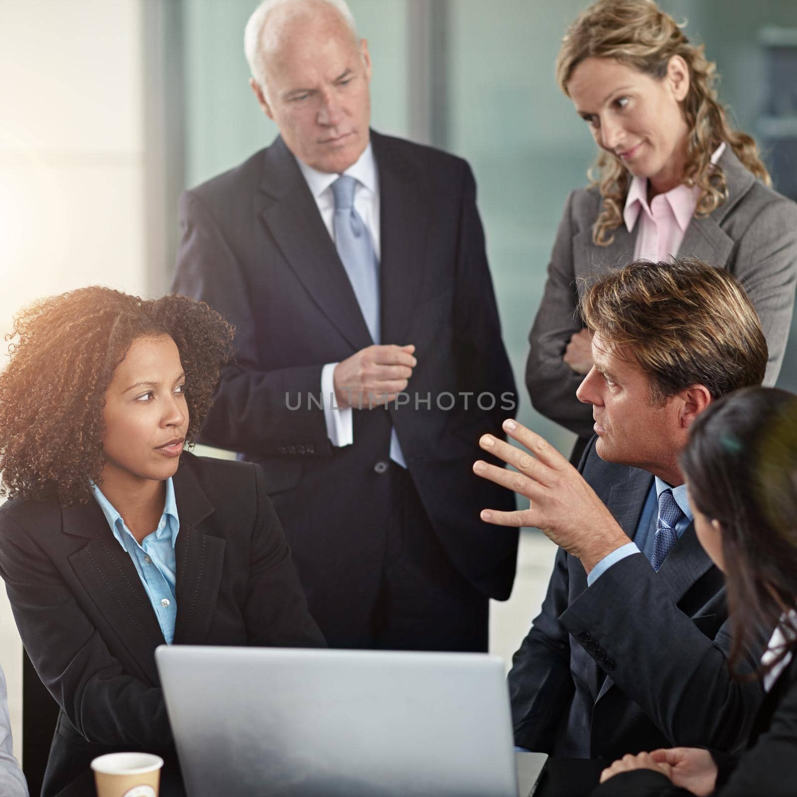 Cropped shot of a group of businesspeople in a meeting.