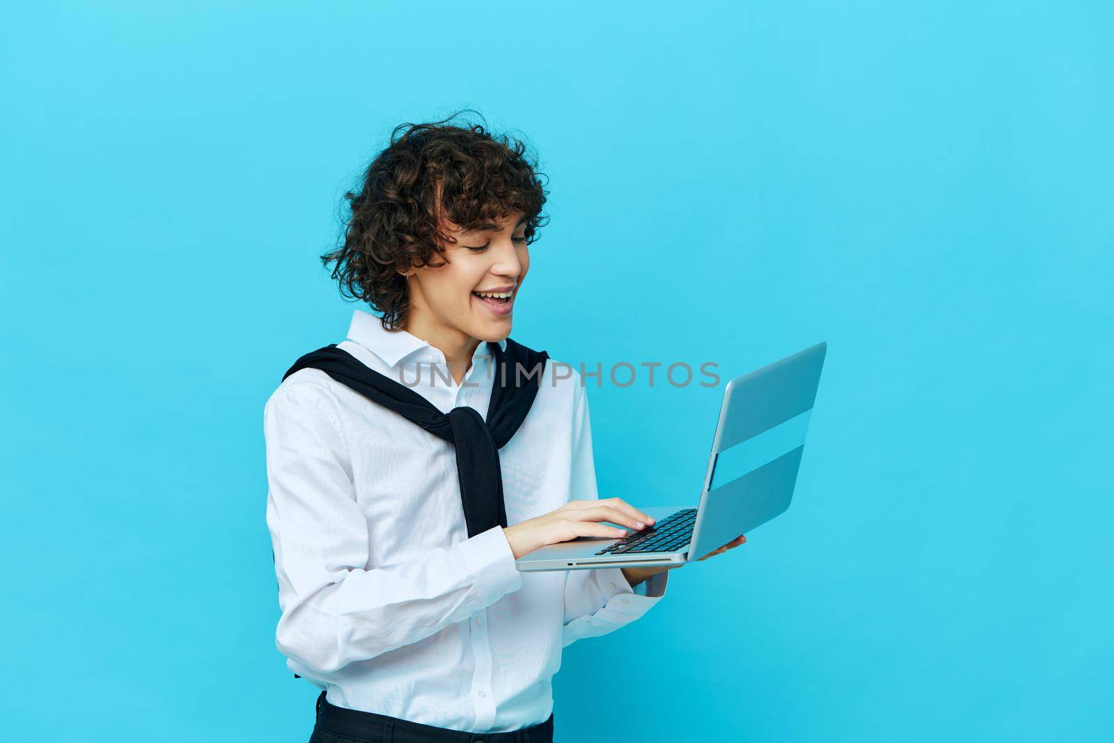 curly guy laptop work online finance Professional cropped view by SHOTPRIME