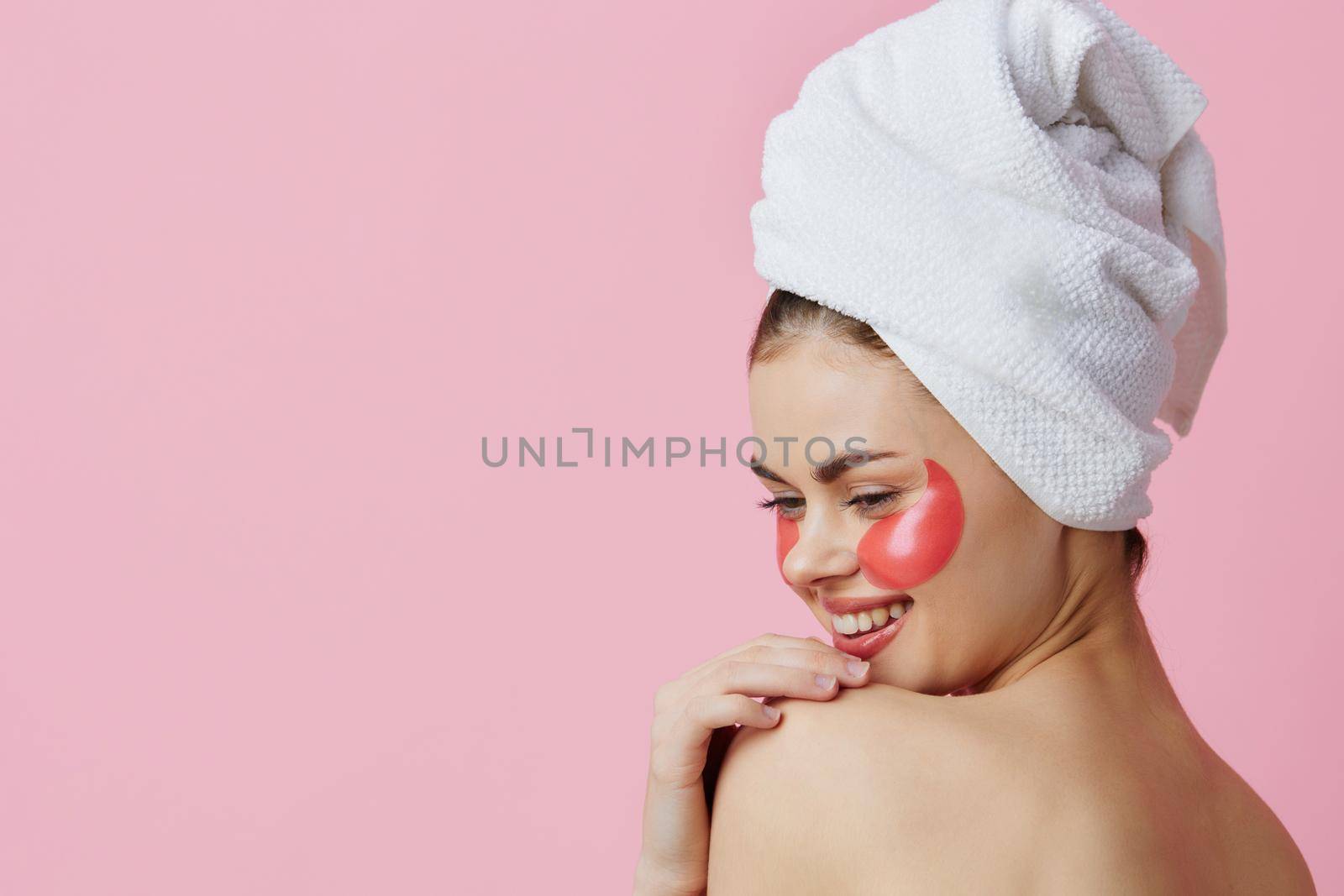 woman patches rejuvenation skin care fun pink background by SHOTPRIME