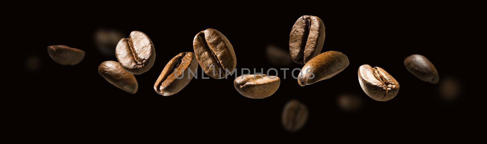 Coffee beans in flight on a dark background.