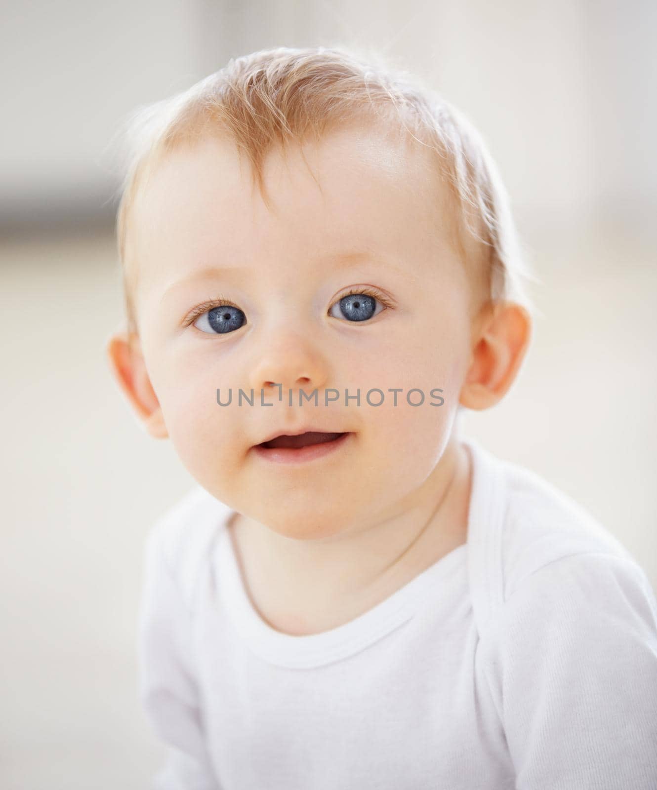 Who could say no to these eyes. Portrait of an adorable baby boy. by YuriArcurs