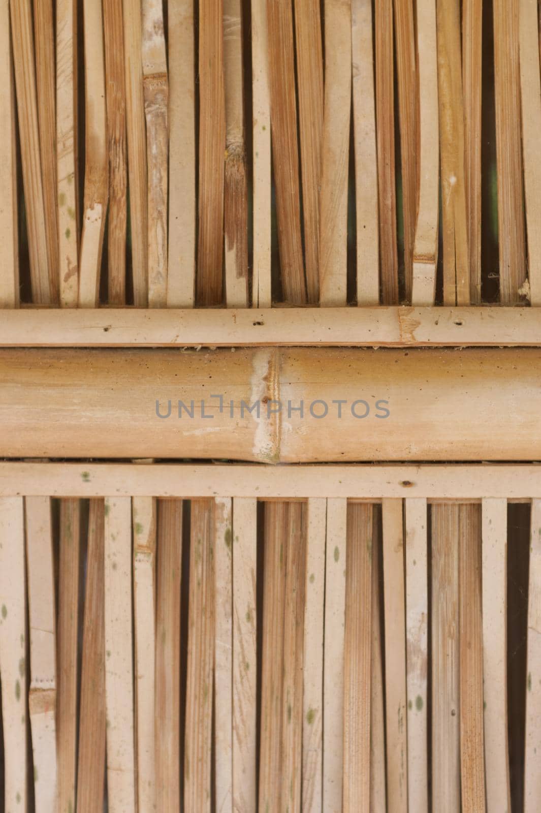 Old brown tone bamboo plank fence texture . by Hepjam