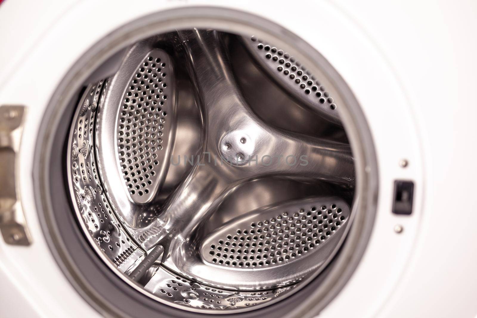 Drum of washing machine dry and clean close-up. Washing Dryer Machine inside view of a drum.