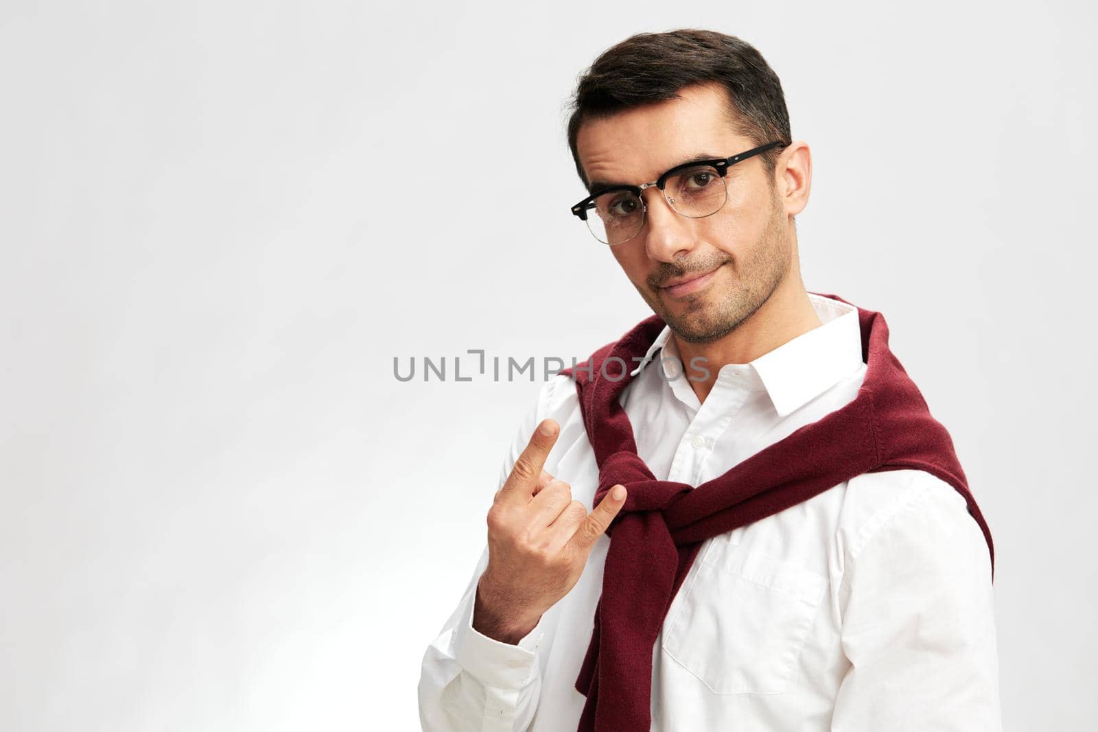 handsome businessman with glasses self confidence posing emotions elegant style. High quality photo