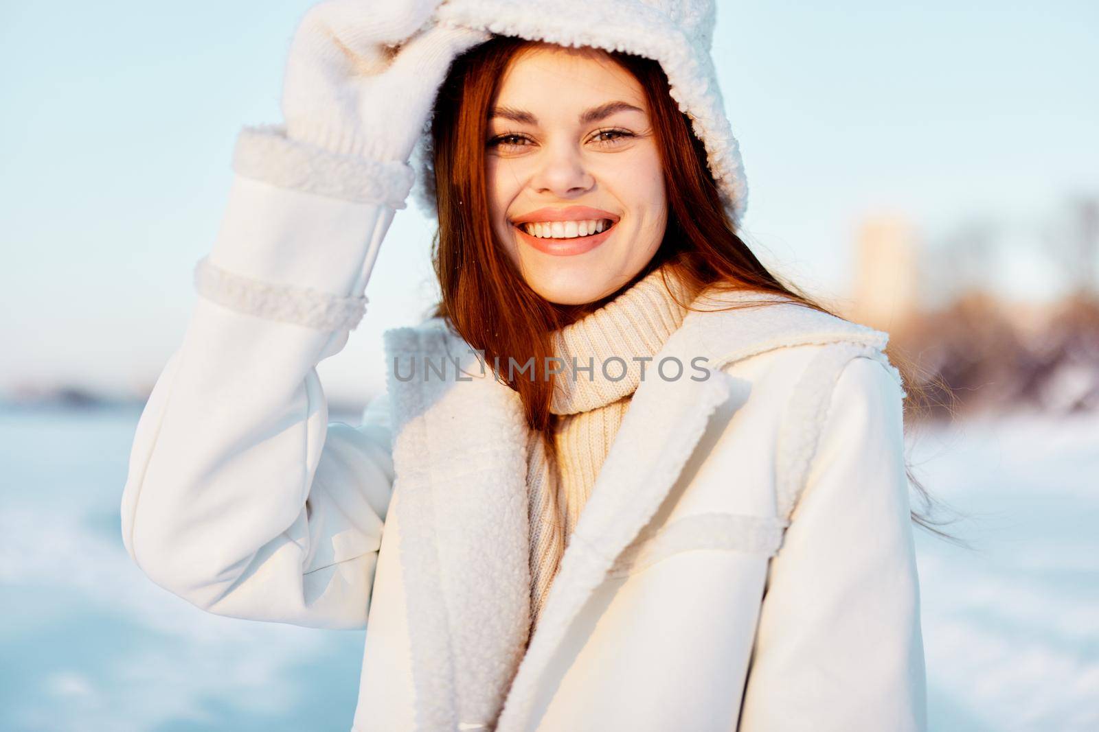 pretty woman winter weather snow posing nature rest travel. High quality photo