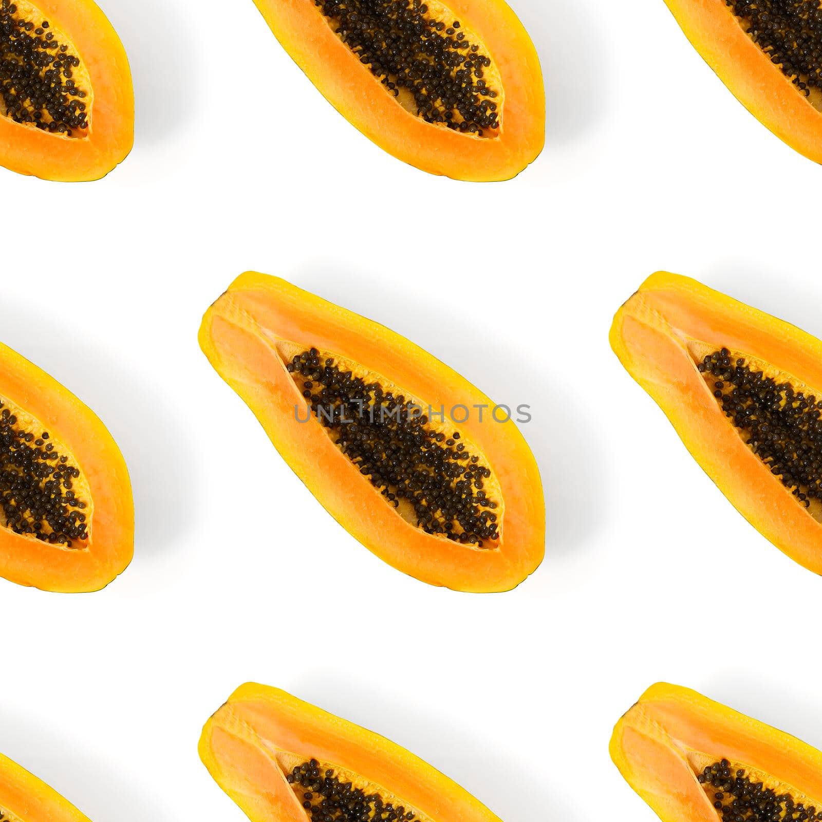 Fresh ripe papaya one direct seamless pattern on white background. Tropical abstract background. Top view. Creative design, minimal flat lay concept. Trend tropical fruit food background pattern