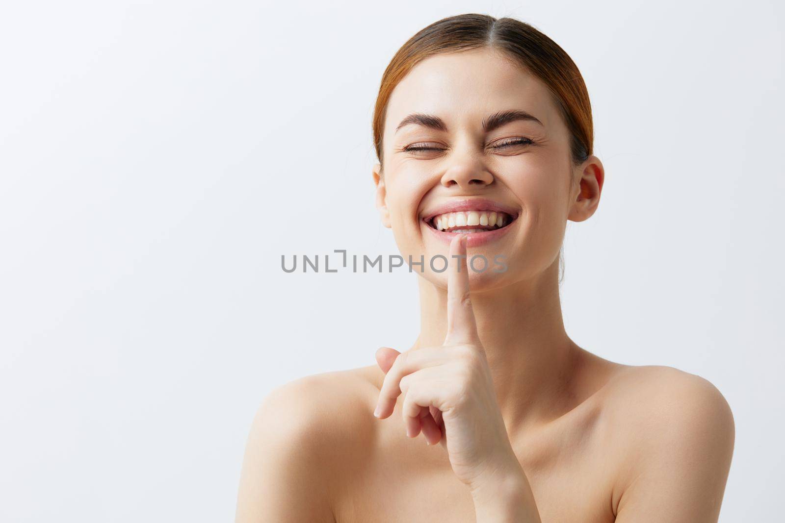 portrait woman posing clean skin care attractive look light background. High quality photo