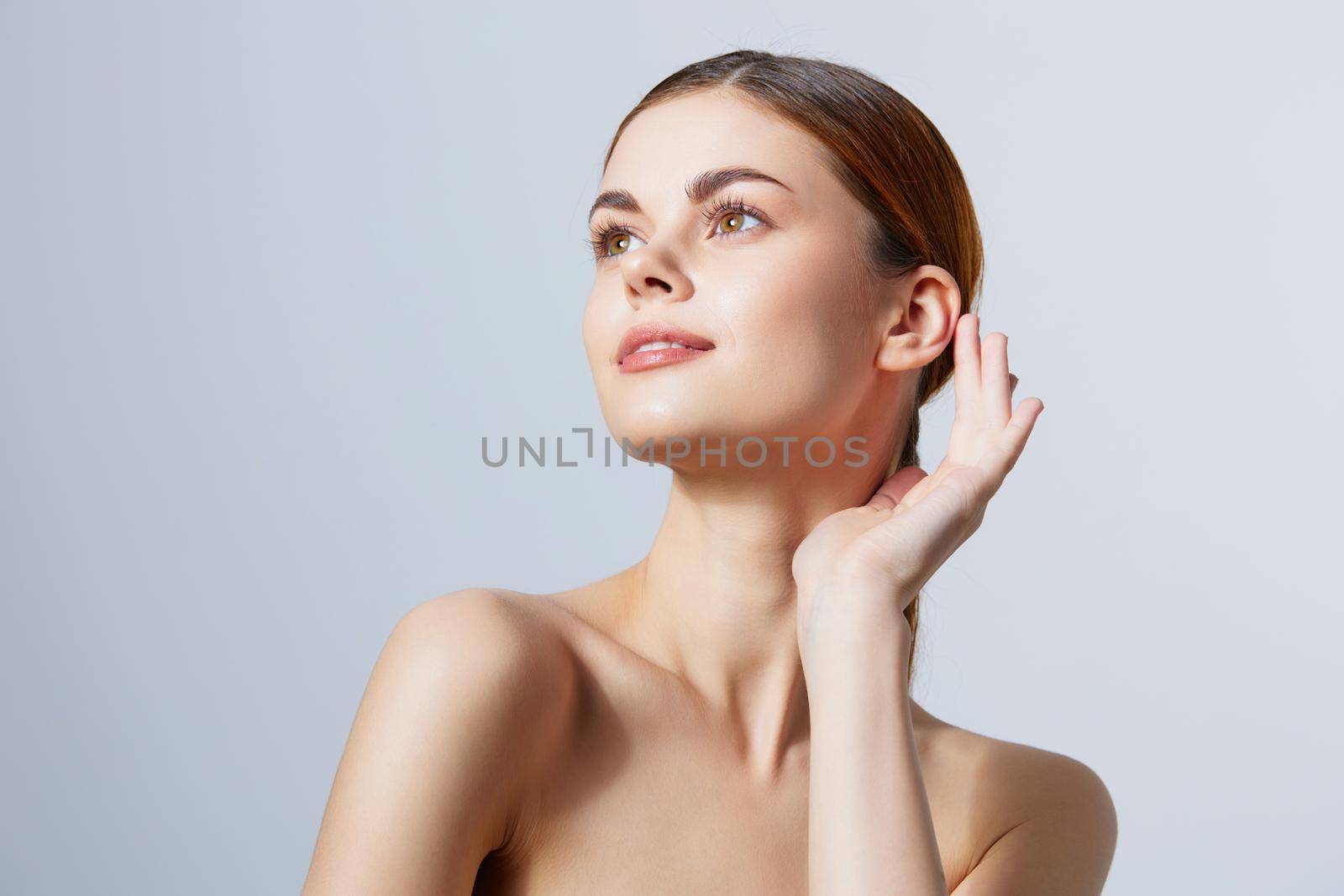 pretty woman posing clean skin care attractive look light background by SHOTPRIME
