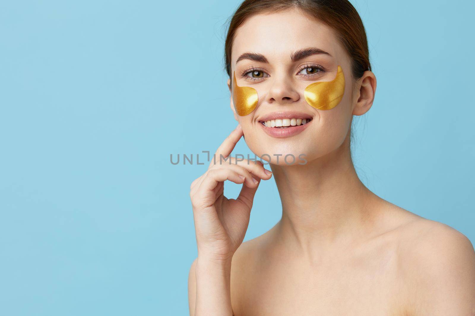woman golden patches clean skin smile posing isolated background. High quality photo