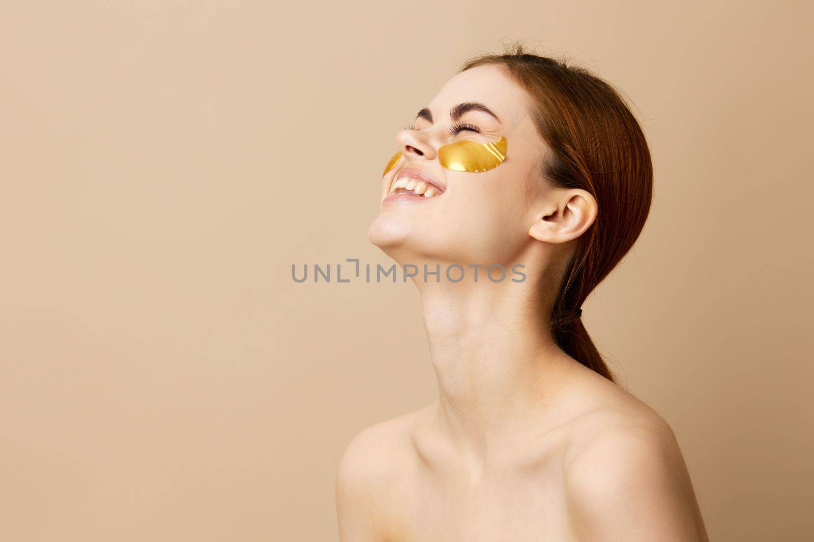 portrait woman golden patches on the face isolated background. High quality photo