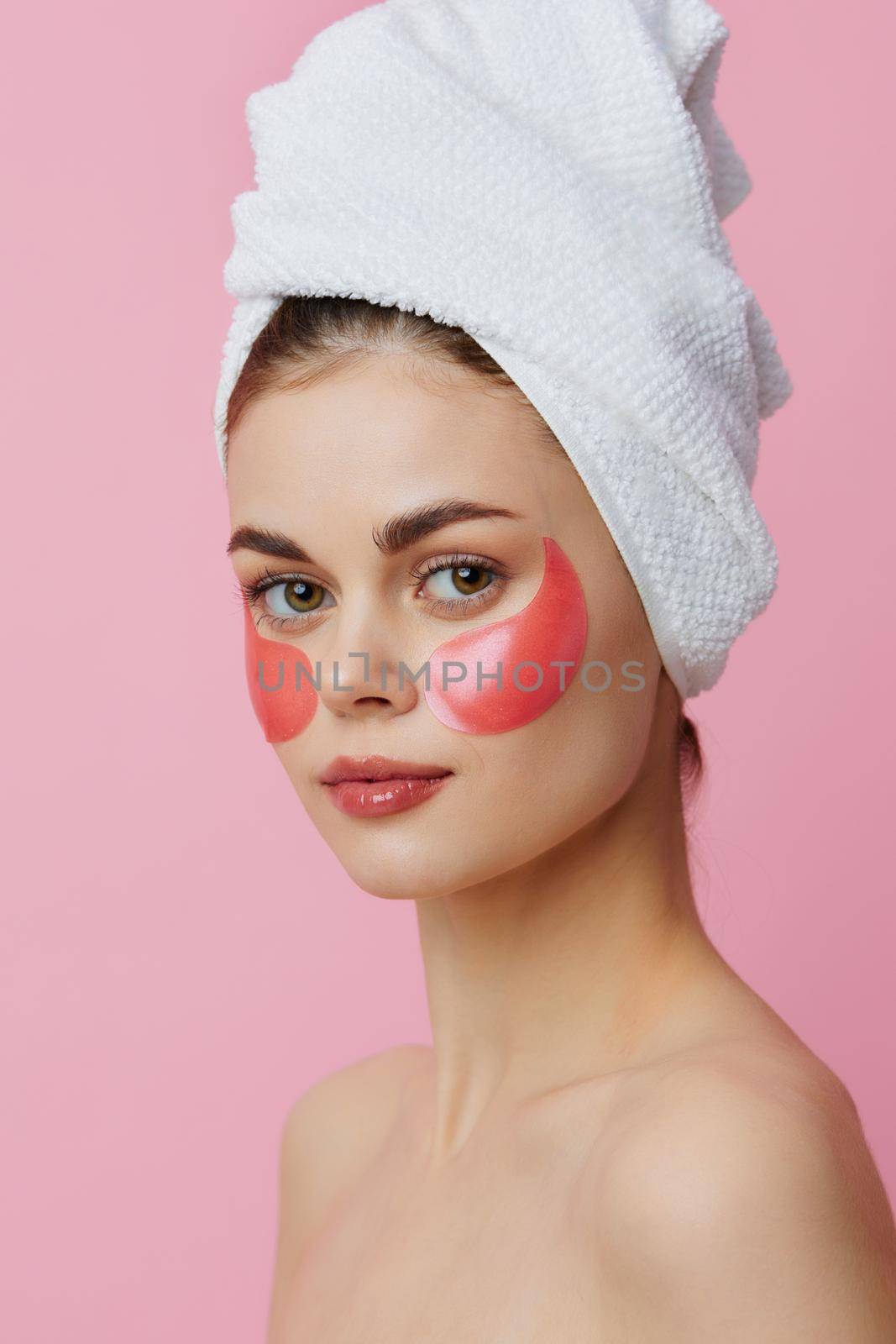 woman skin care face patches bare shoulders close-up Lifestyle. High quality photo