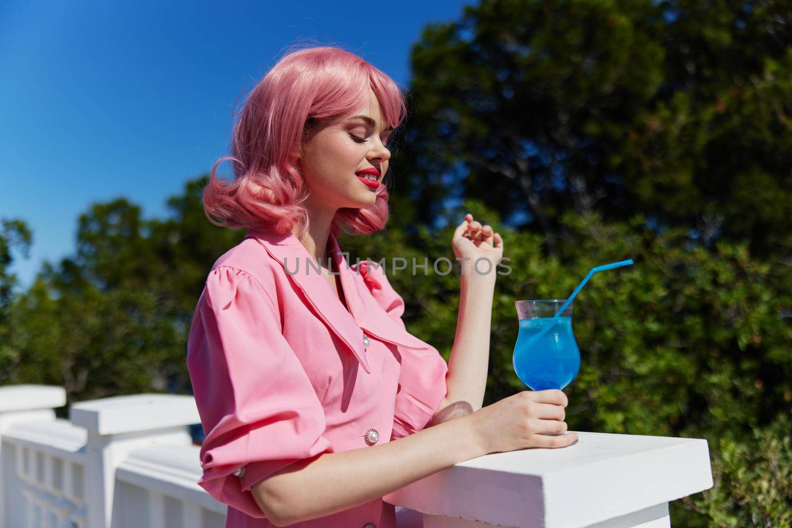 cheerful woman with pink hair summer cocktail refreshing drink unaltered by SHOTPRIME