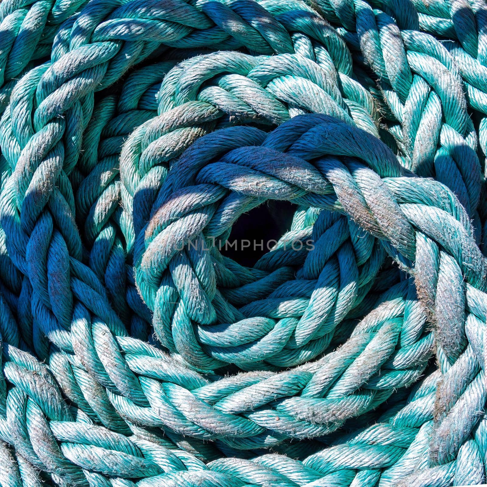 Close-up of an old frayed boat rope as a nautical background