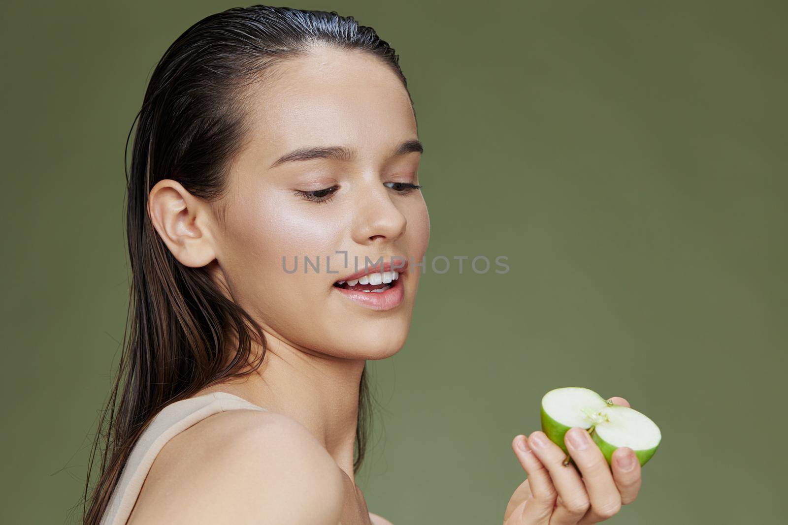 beautiful woman happy smile green apple health isolated background. High quality photo