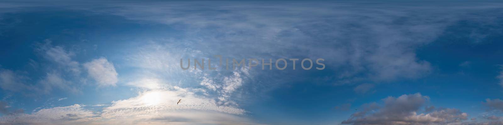 Sky panorama with Cirrus clouds in Seamless spherical equirectangular format. Full zenith for use in 3D graphics, game and editing aerial drone 360 degree panoramas for sky replacement