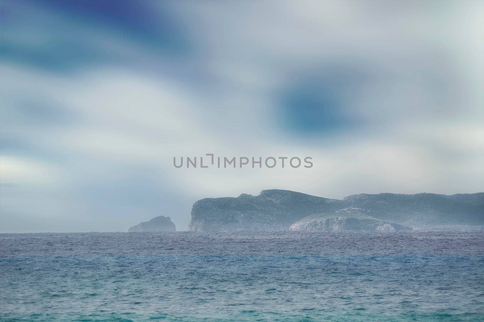 Island silhouette in the mist. Long exposure. Mediterranean Sea. Balearic Islands, Mystic, Without people. Fog