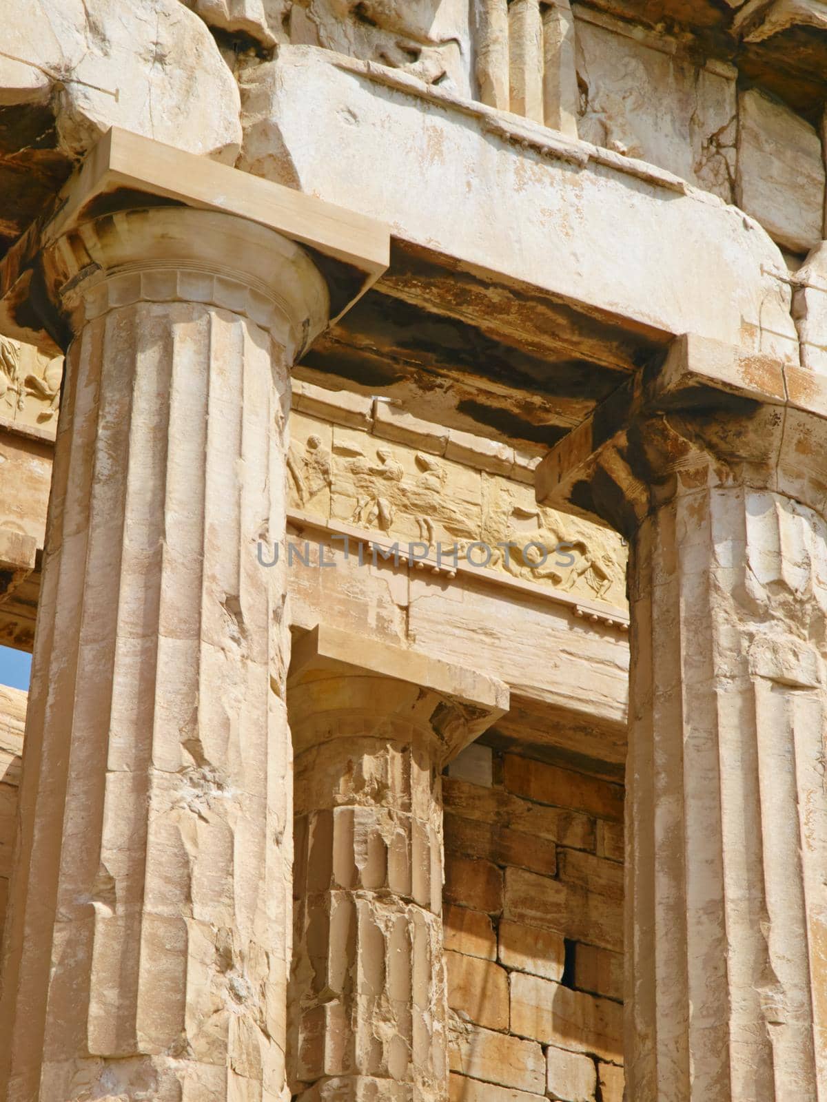 OLYMPUS DIGITAL CAMERA. Giant pillars in Acropolis, Greece. by YuriArcurs