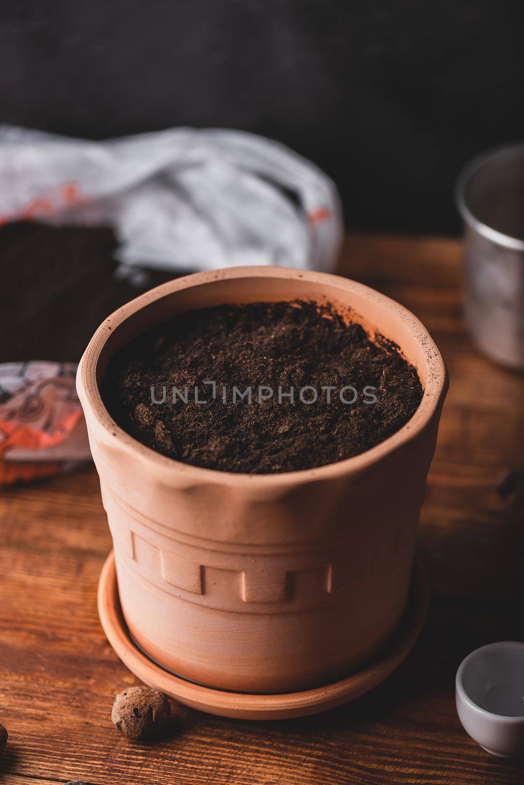 Flower Pot Filled with Soil by Seva_blsv