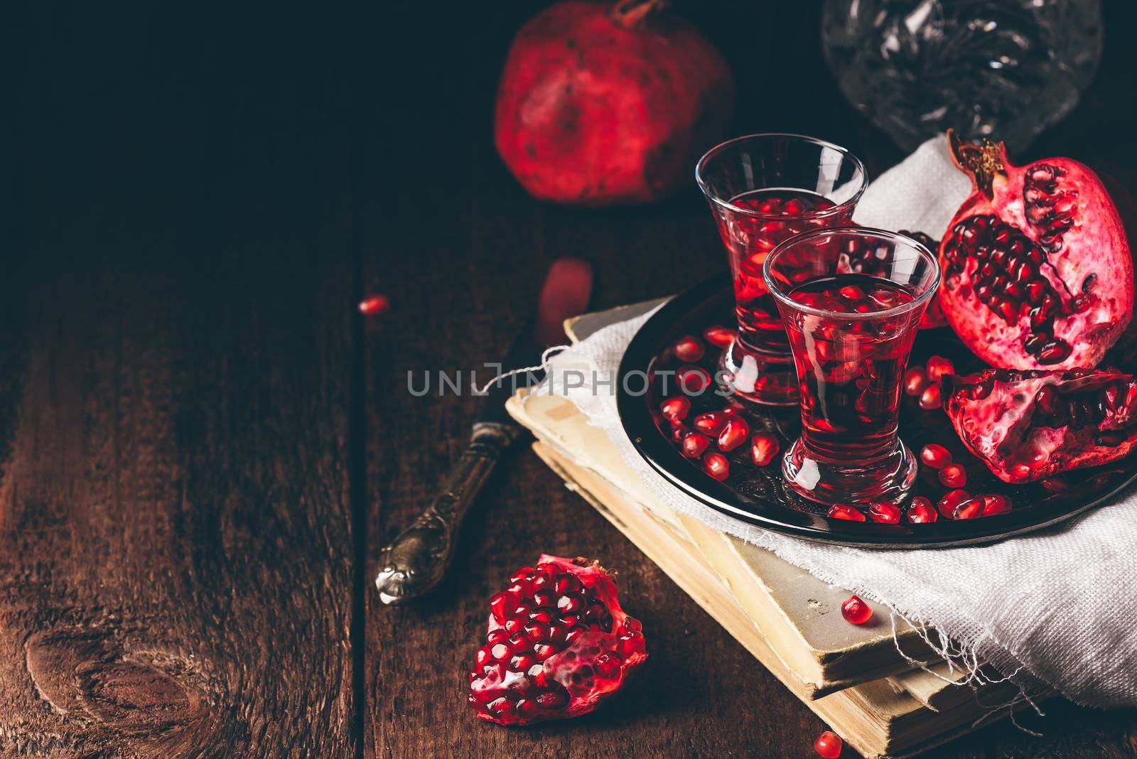 Fruit cocktail with pomegranate on metal tray