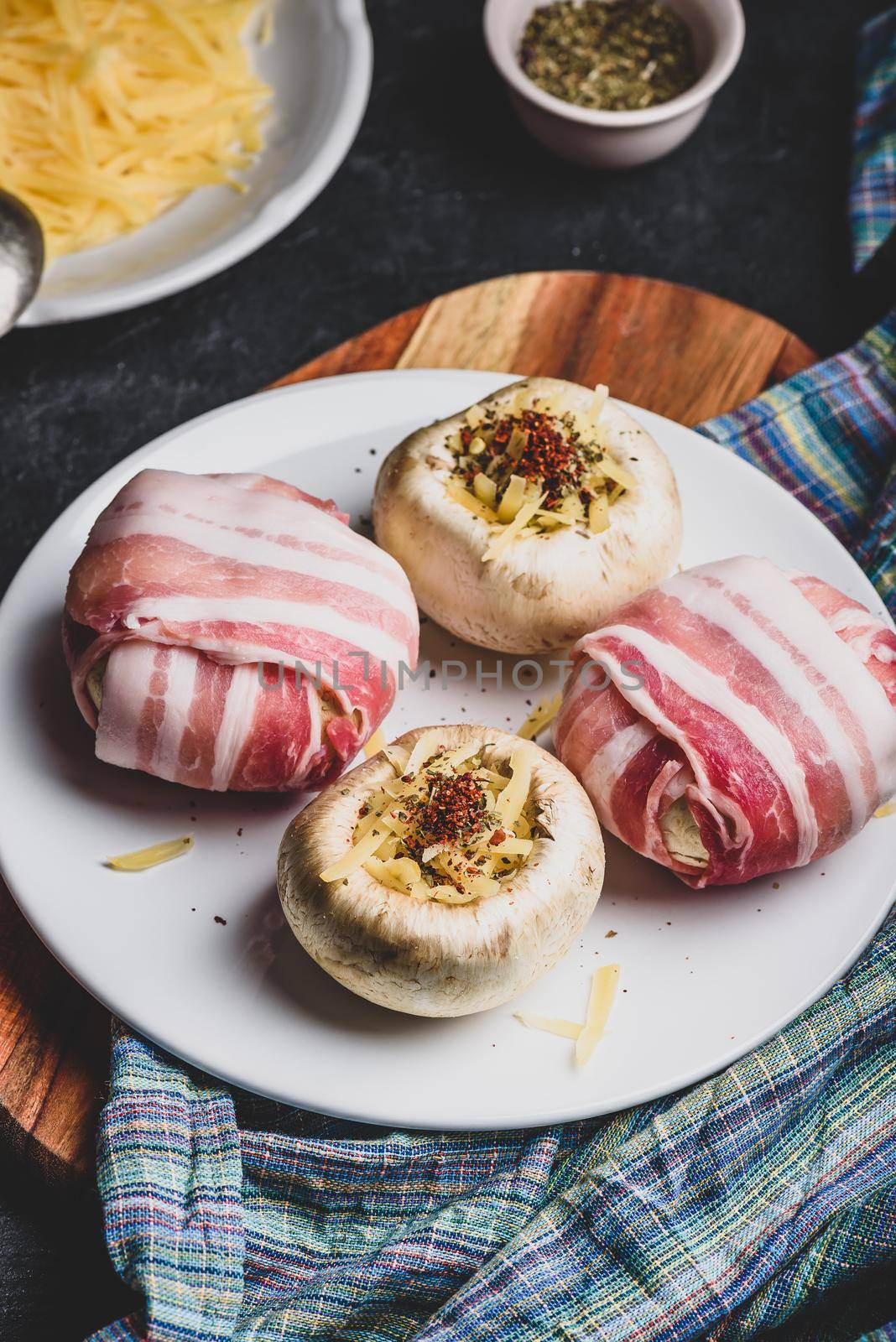 Bacon-wrapped button mushrooms stuffed with cheese by Seva_blsv