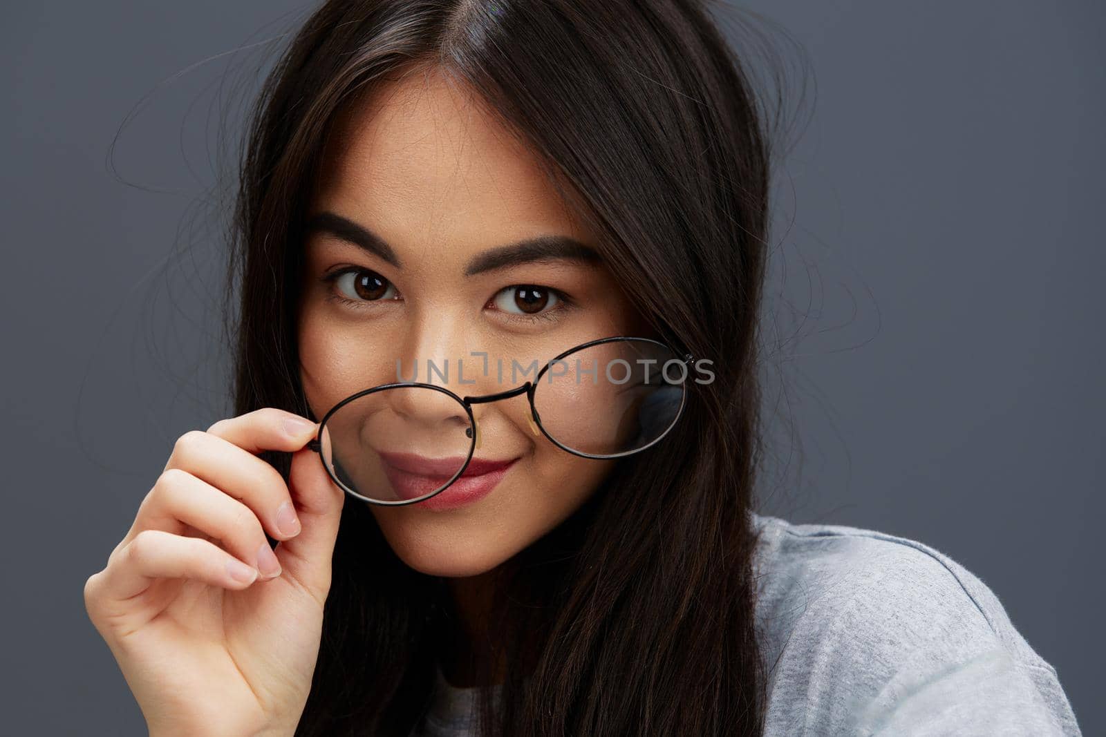 woman glasses on face fashion lifestyle gray t-shirt isolated background by SHOTPRIME
