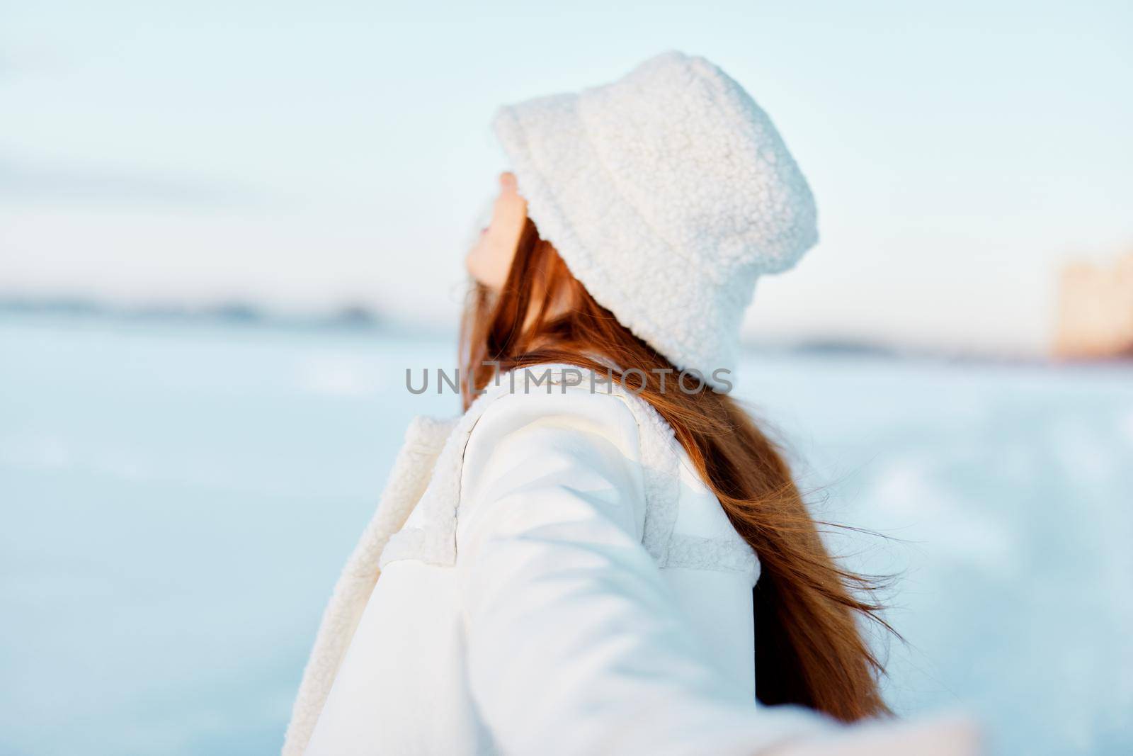 young woman winter clothes walk snow cold vacation travel. High quality photo