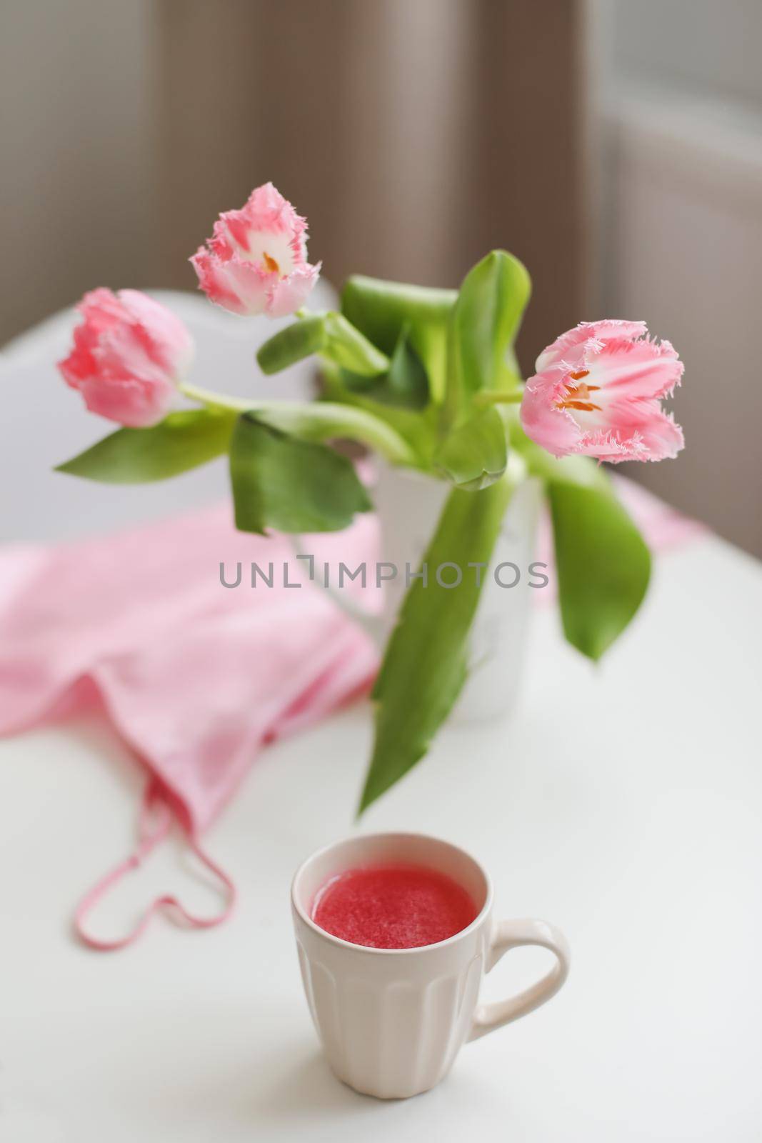 spring still life with fresh pink tulips, home decor