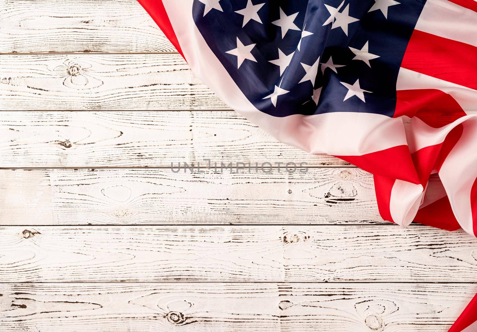 USA national flag on white wooden background by Desperada