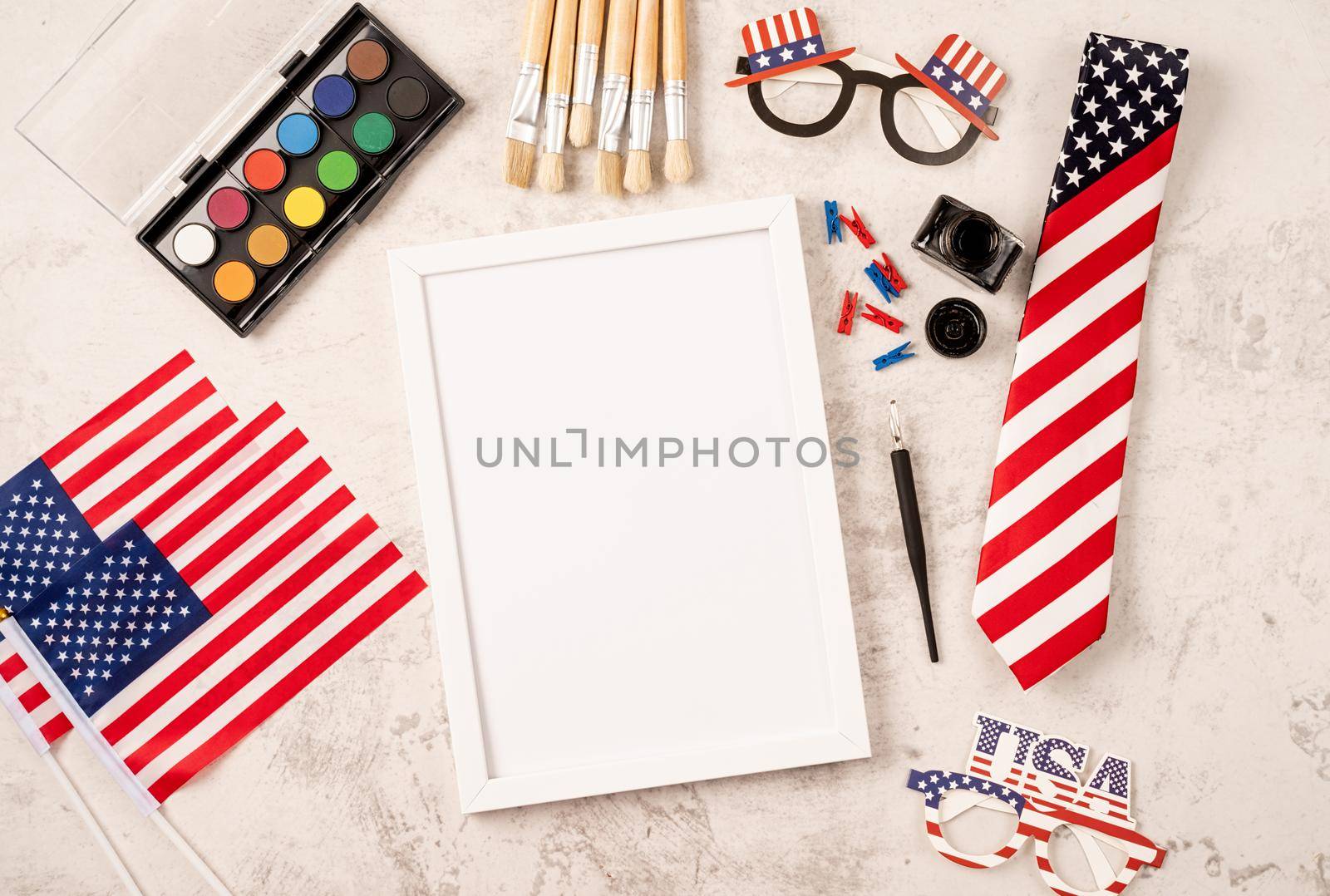 Blank frame for mockup design with USA independence day party elements top view flat lay by Desperada