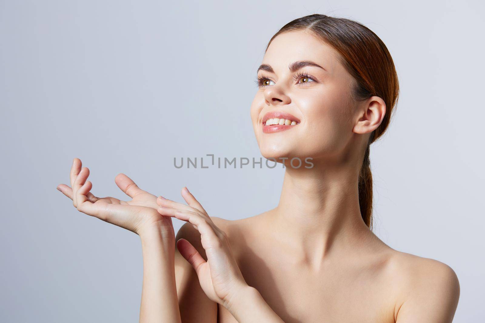 beautiful woman posing clean skin care attractive look isolated background by SHOTPRIME