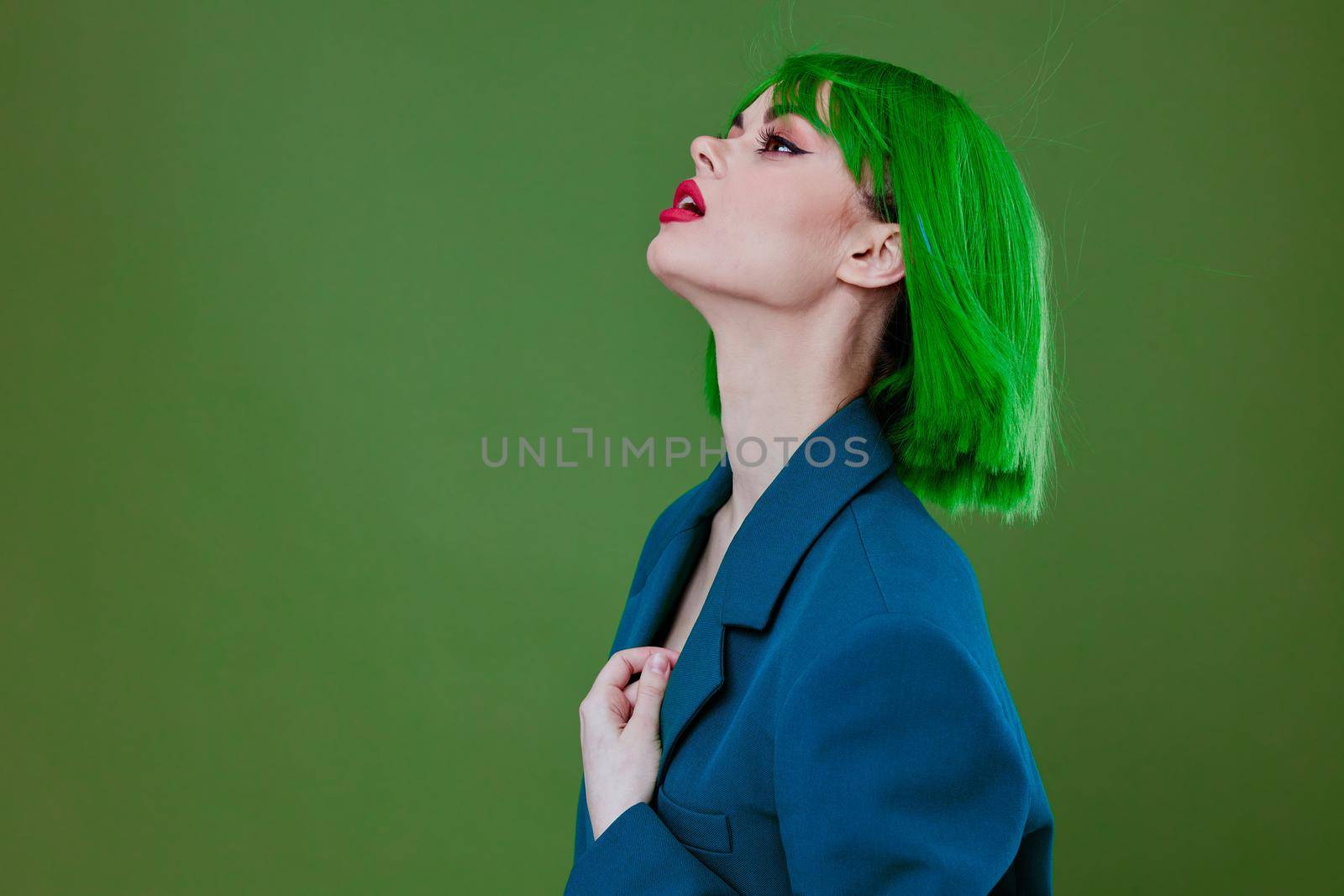 Young woman fun gesture hands green hair fashion studio model unaltered by SHOTPRIME