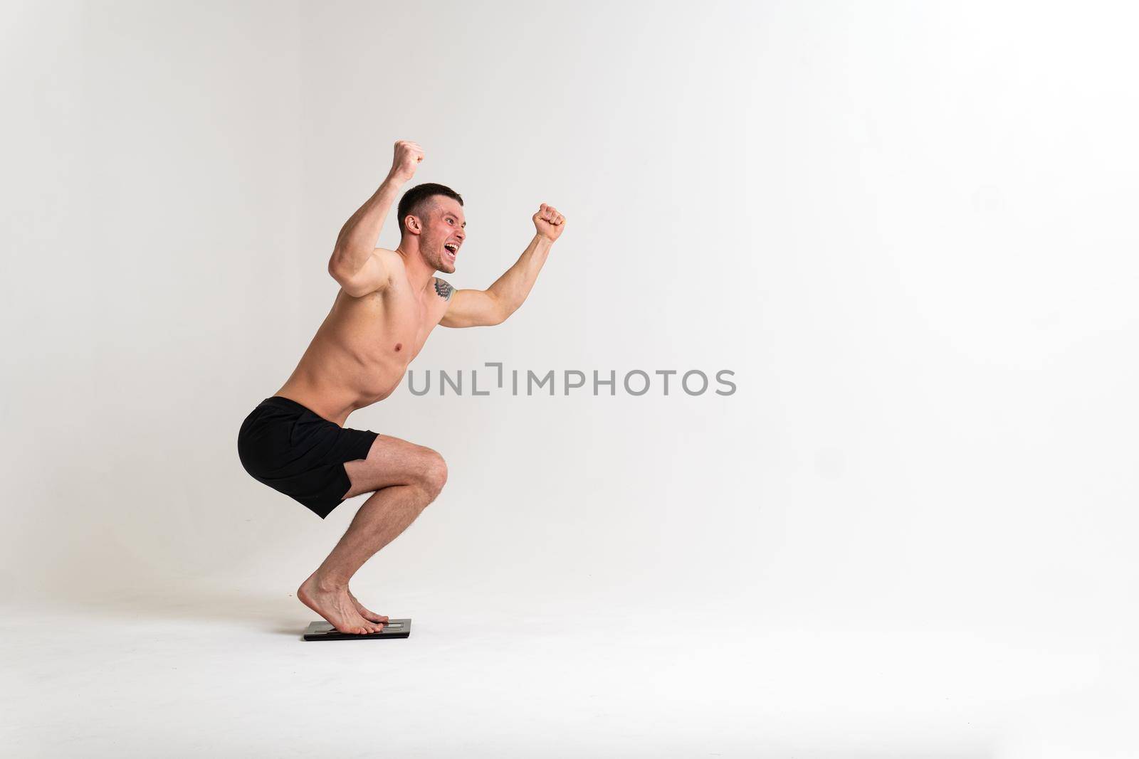 Man with weights health pondered, health and sports on a white background sore painful, cramp person male background medical, hand holding. Hold neck care, ain suffer attractive