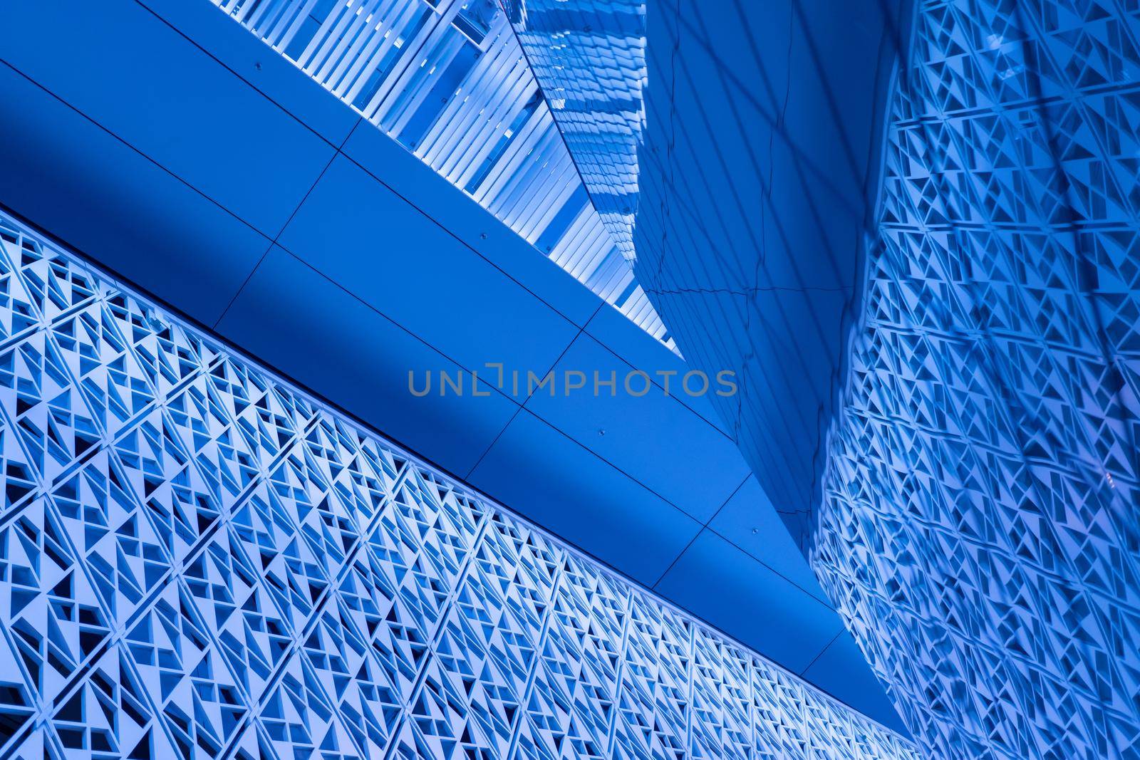 Angled pattern on the facade of a modern architecture building by Zurijeta