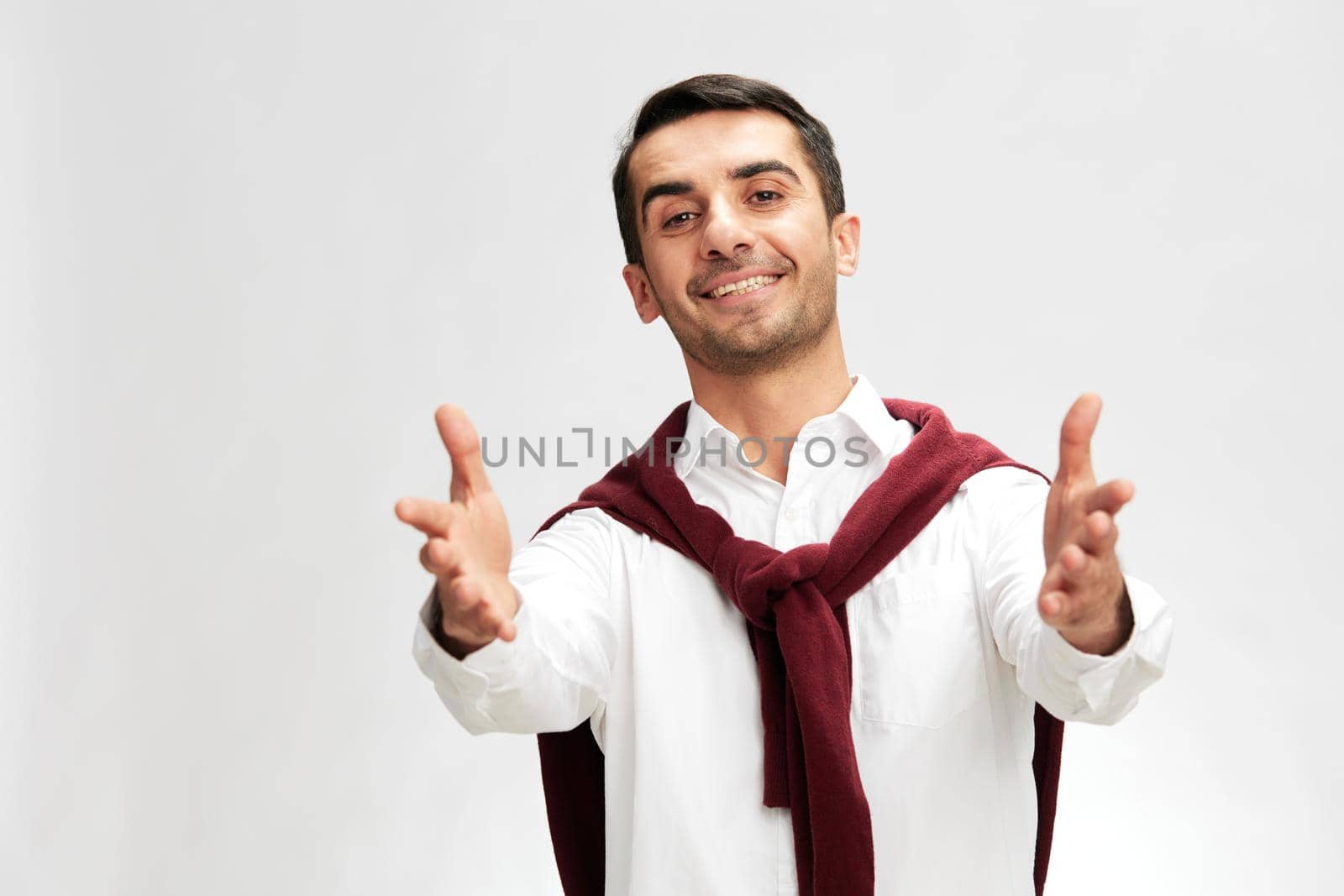 successful man red sweater on shoulders glasses lifestyle business and office concept. High quality photo