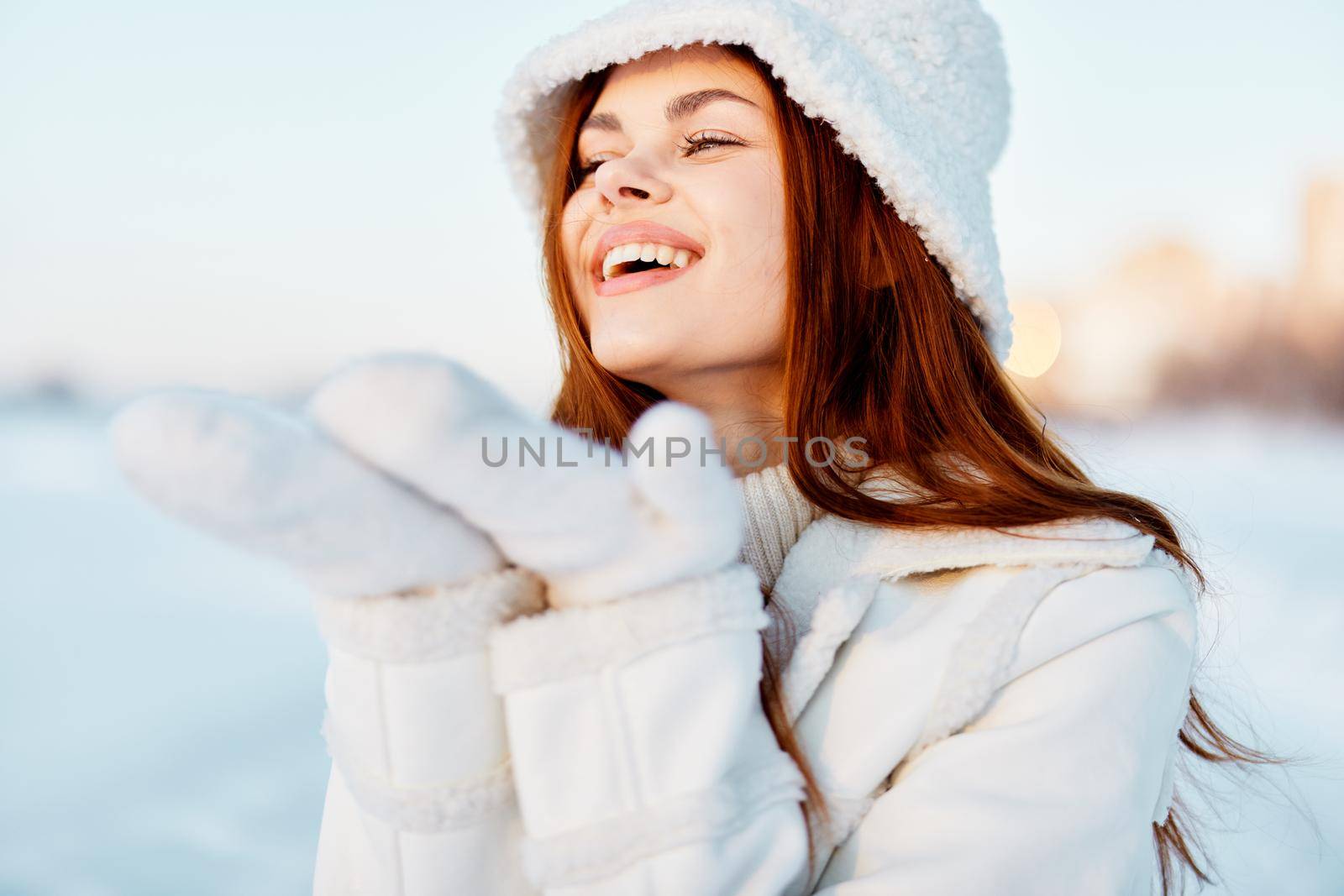 young woman winter clothes walk snow cold vacation Fresh air. High quality photo