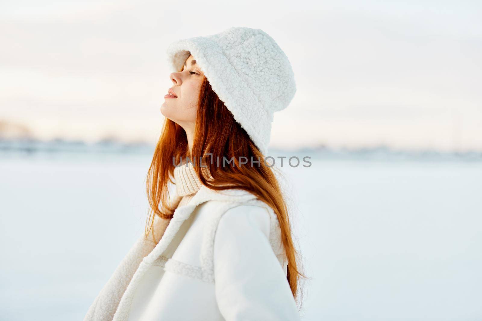 pretty woman smile Winter mood walk white coat Fresh air. High quality photo