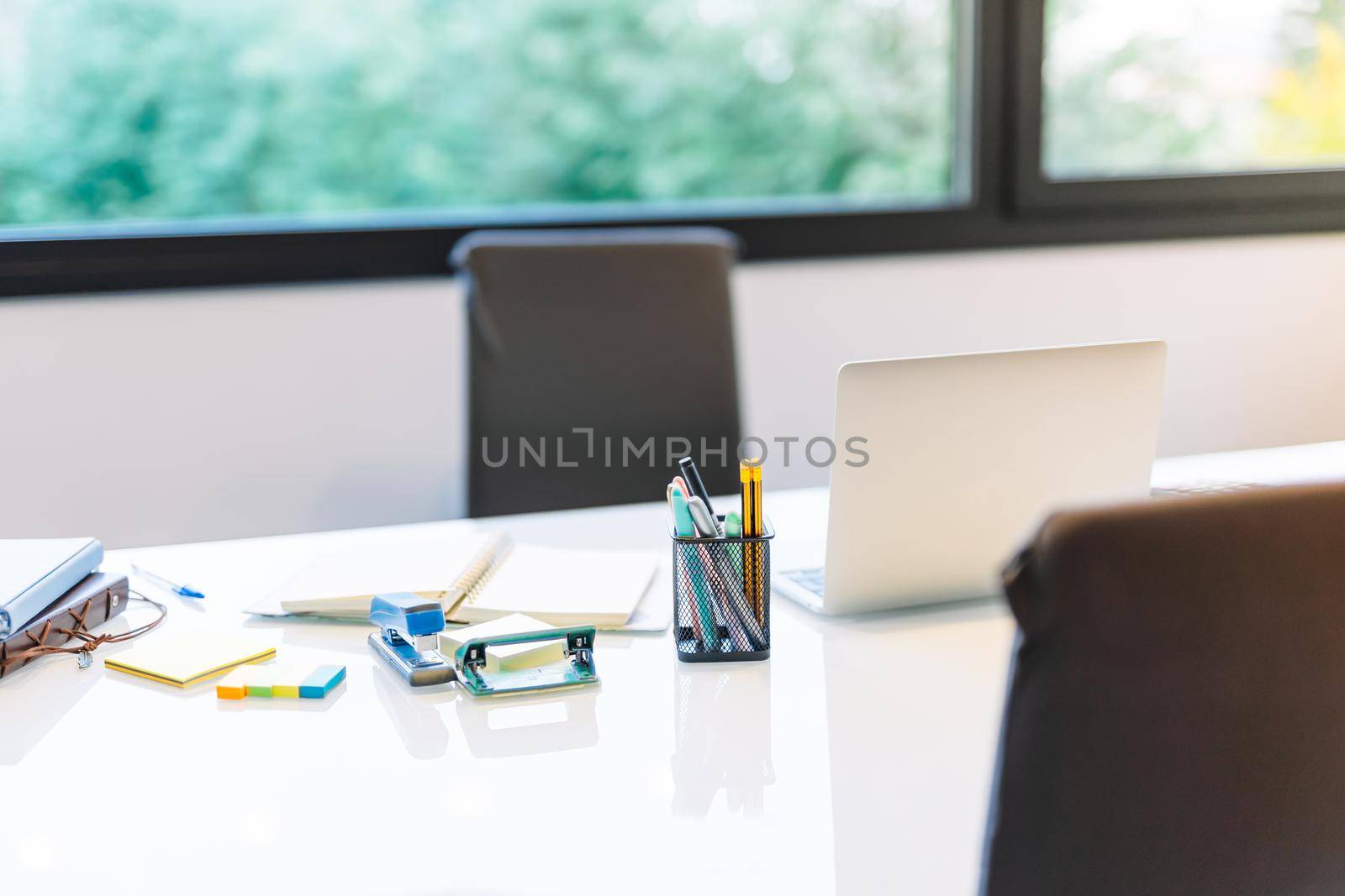 Home office work table with laptop and others by CatPhotography