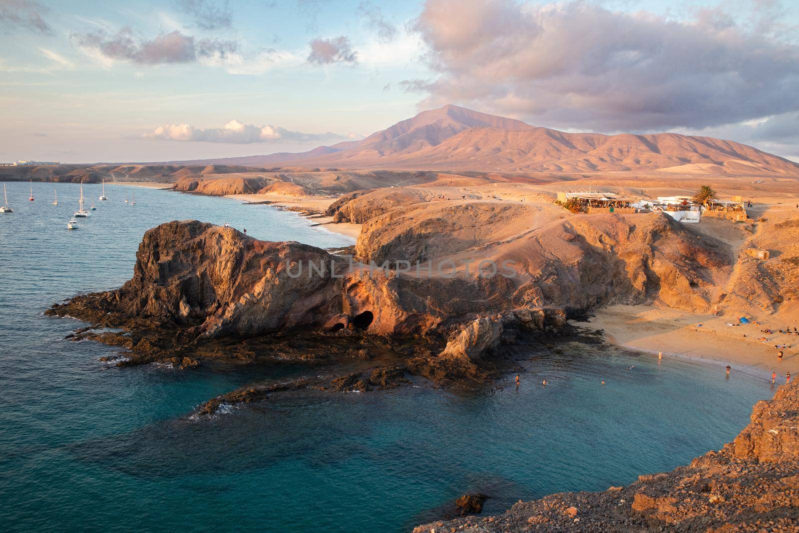 Landscape with turquoise ocean water on Papagayo beach, Lanzarote, Canary Islands, Spain