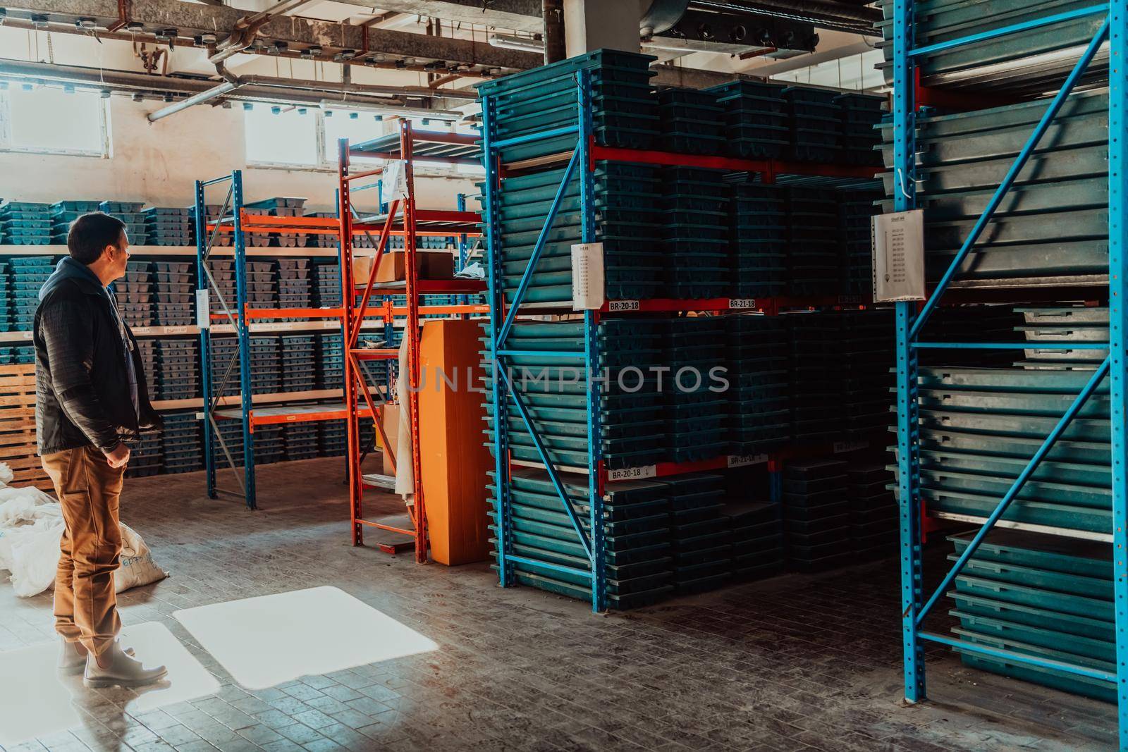 Gold mining storage rock core samples geology drilling industry. Large ore warehouse in modern industry, ores stacked in boxes. Selective focus. High-quality photo