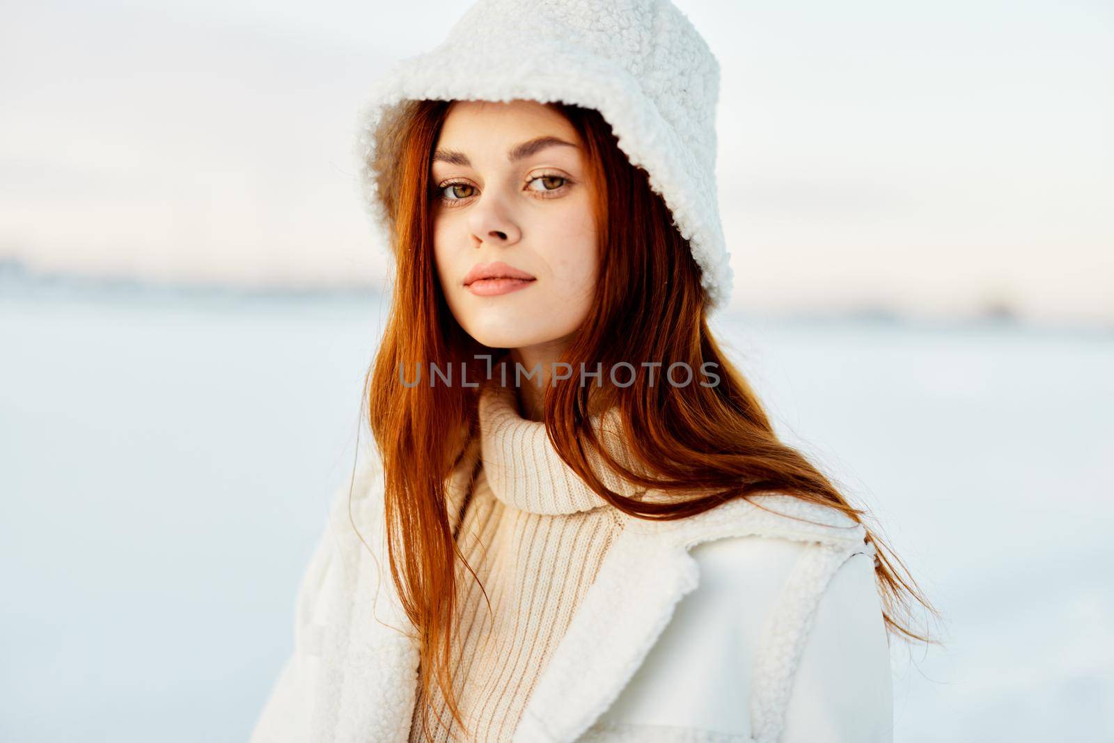 beautiful woman winter weather snow posing nature rest nature. High quality photo