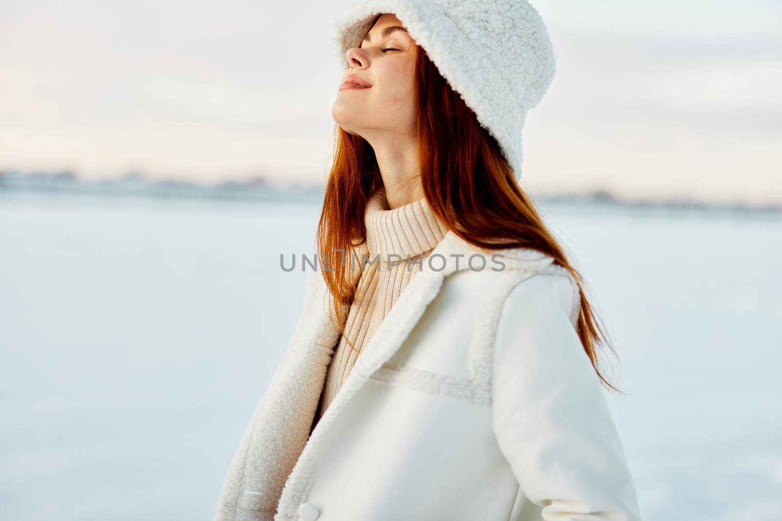 pretty woman smile Winter mood walk white coat Fresh air. High quality photo