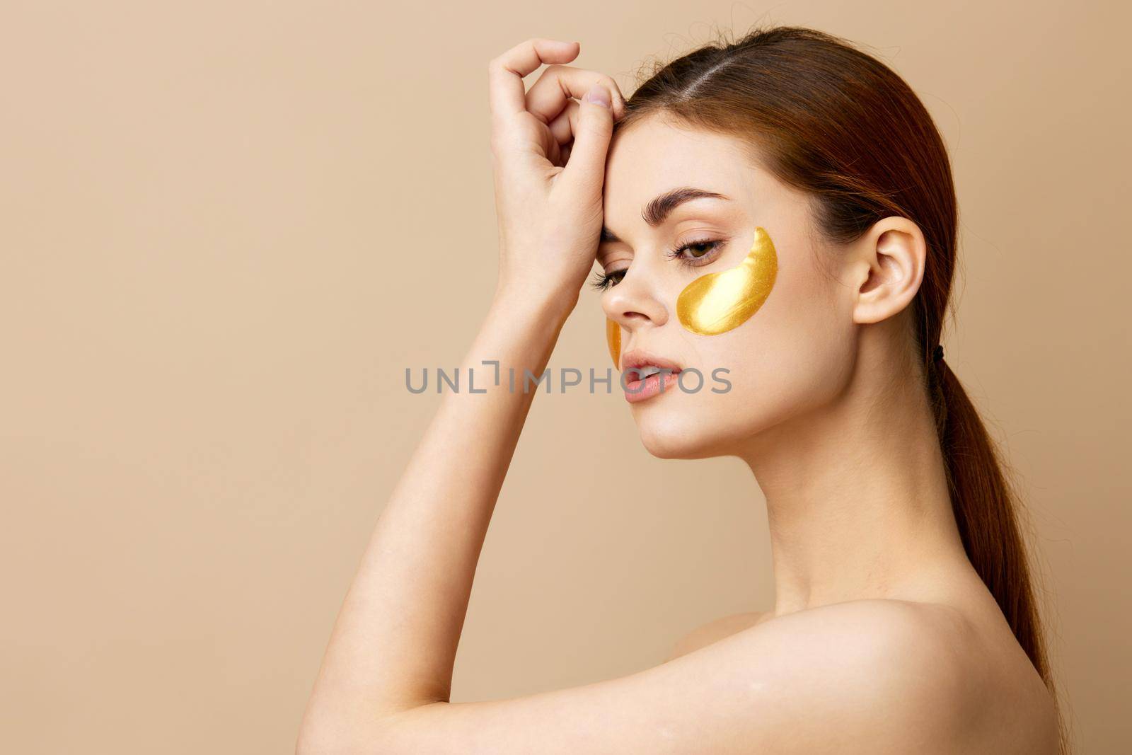 portrait woman skin care face patches bare shoulders hygiene close-up Lifestyle. High quality photo